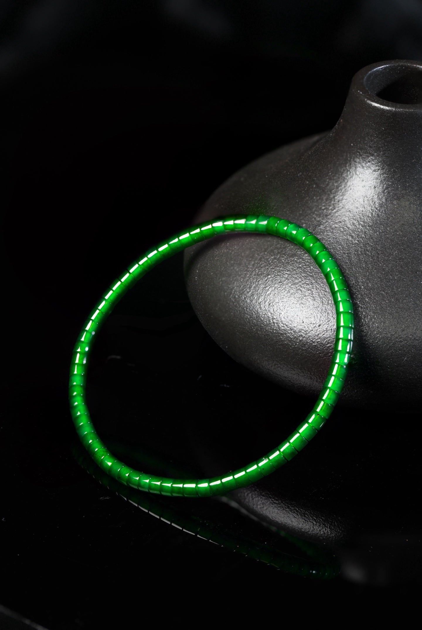 Barrel-bead jadeite bangles, 68 beads, dimensions 3.4mm x 2.5mm.