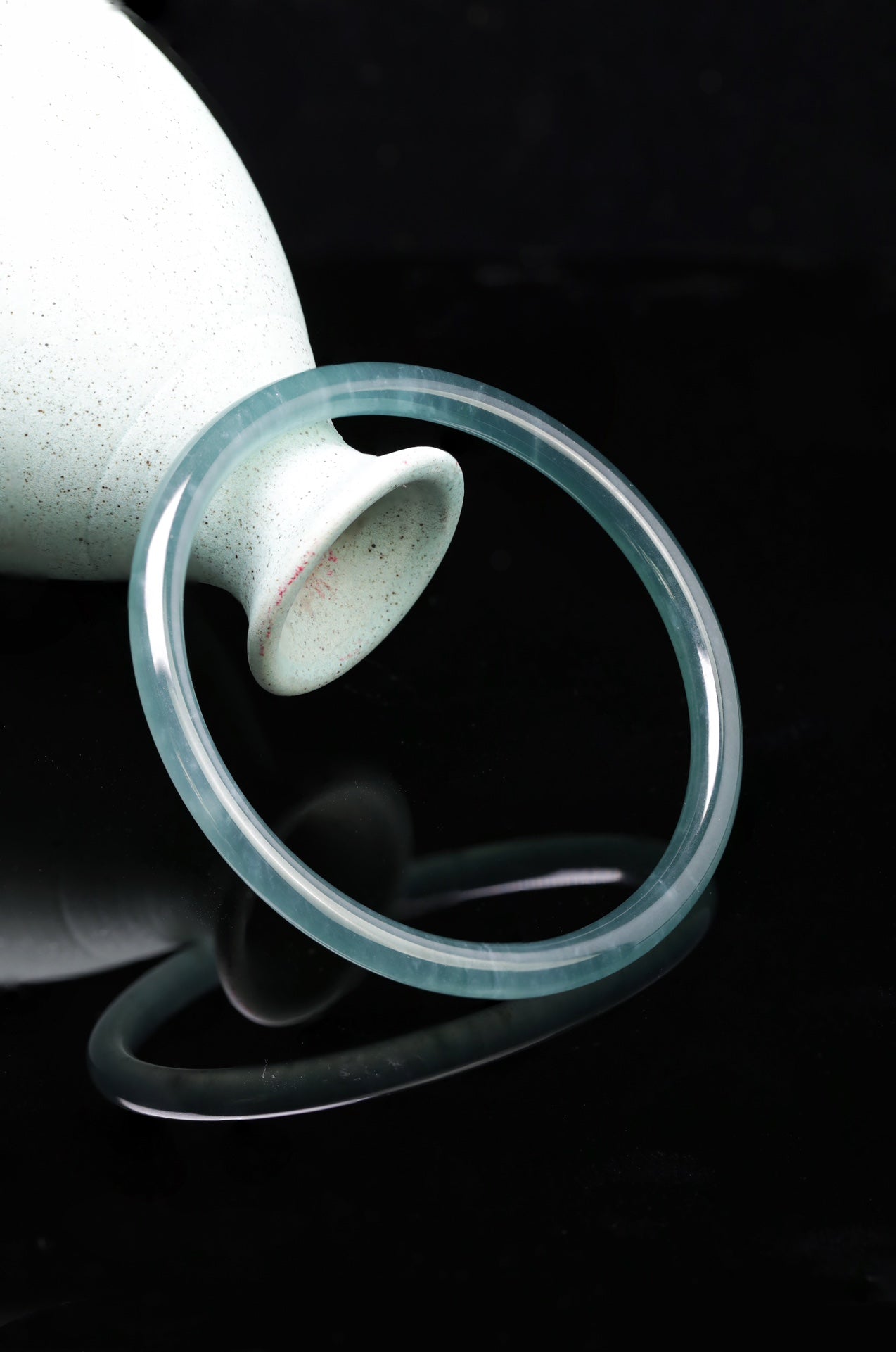 Blue-water round-profile jadeite bangle, size 60mm.