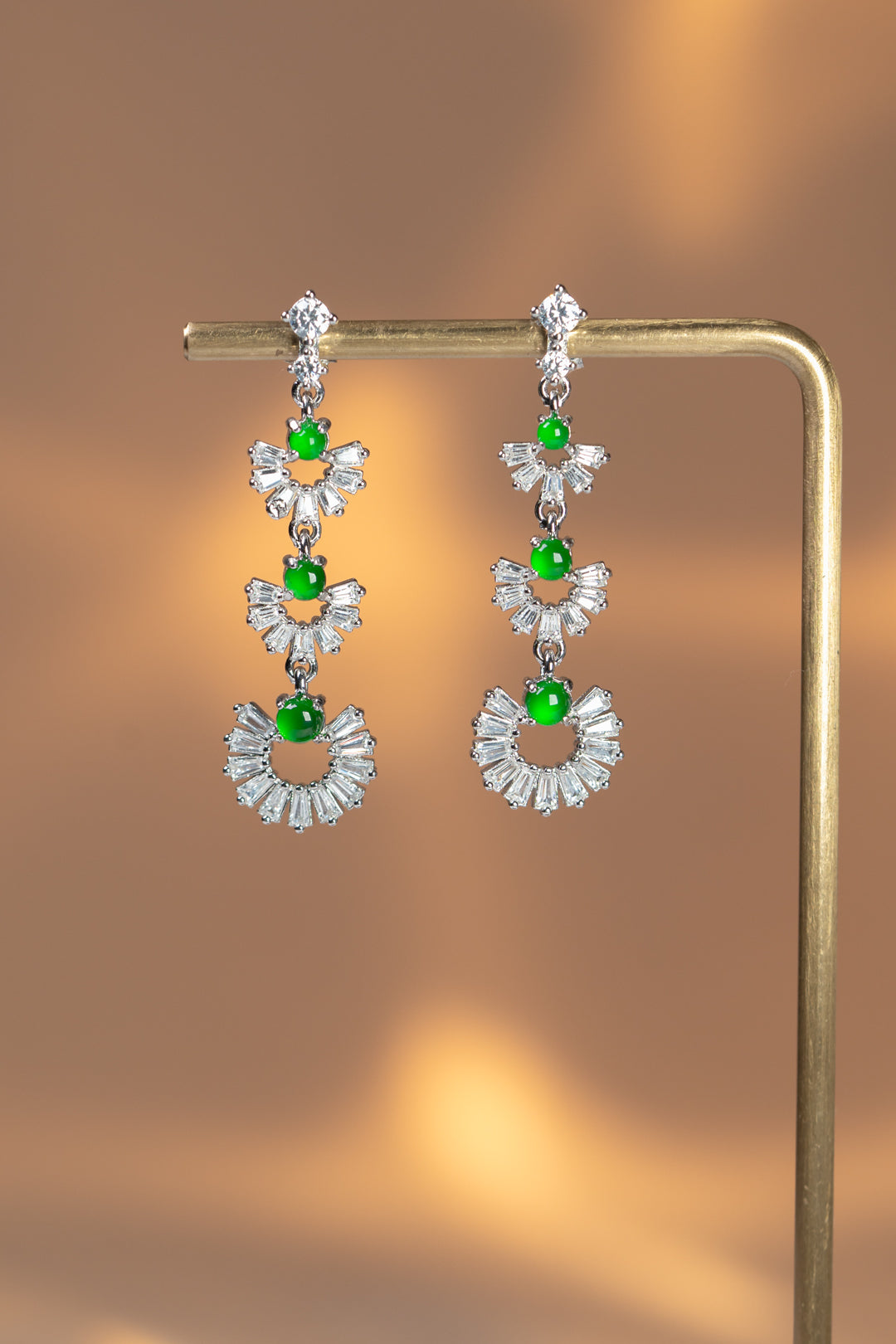 925 silver and oval jadeite cabochon earrings; overall dimensions: 25.5mm x 10mm x 2.5mm.