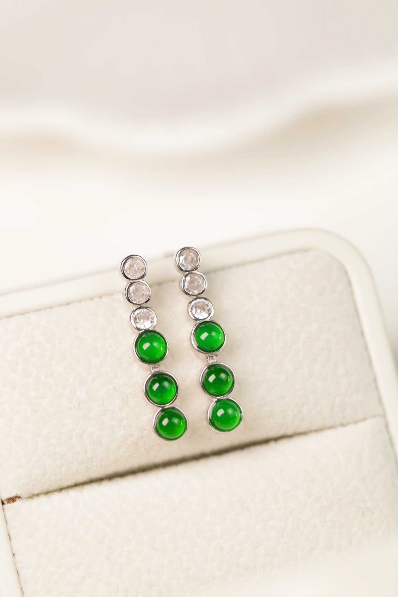 925 silver jadeite drop earrings featuring oval cabochons; overall dimensions: 22mm x 4.4mm x 2.5mm.
