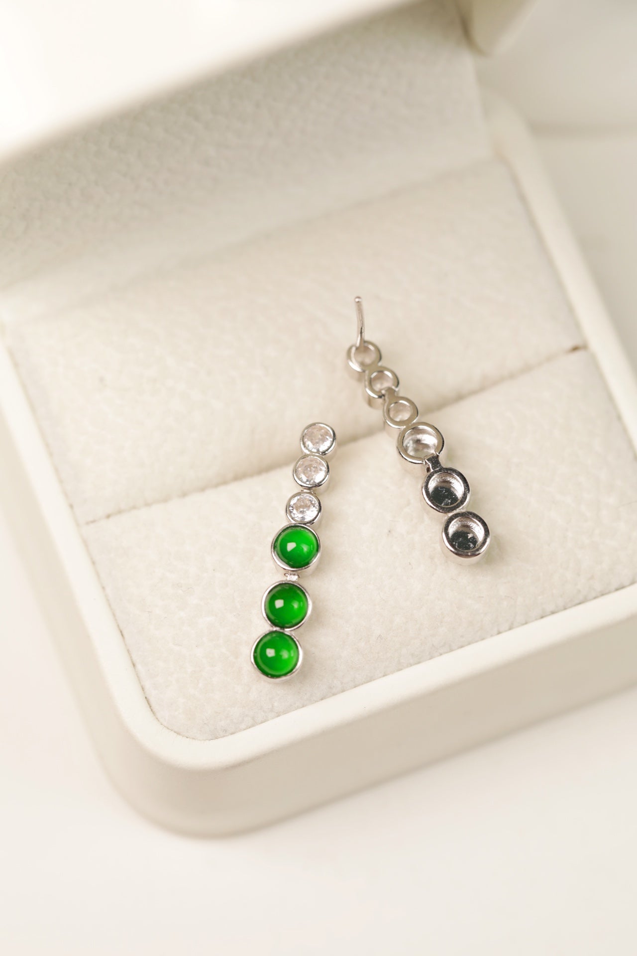 925 silver jadeite drop earrings featuring oval cabochons; overall dimensions: 22mm x 4.4mm x 2.5mm.