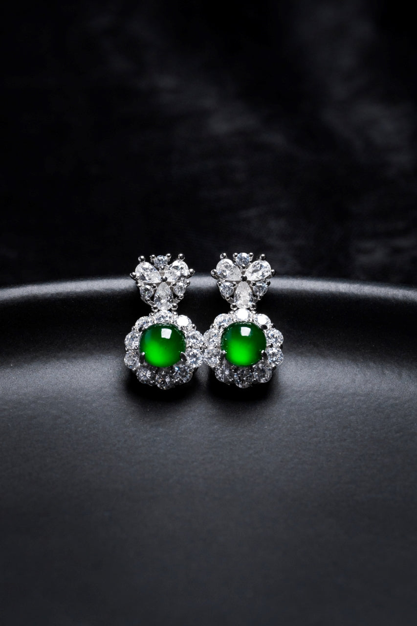 925 Silver Oval Jadeite Stud Earrings; overall dimensions: 15.3mm x 8.6mm x 6.4mm.