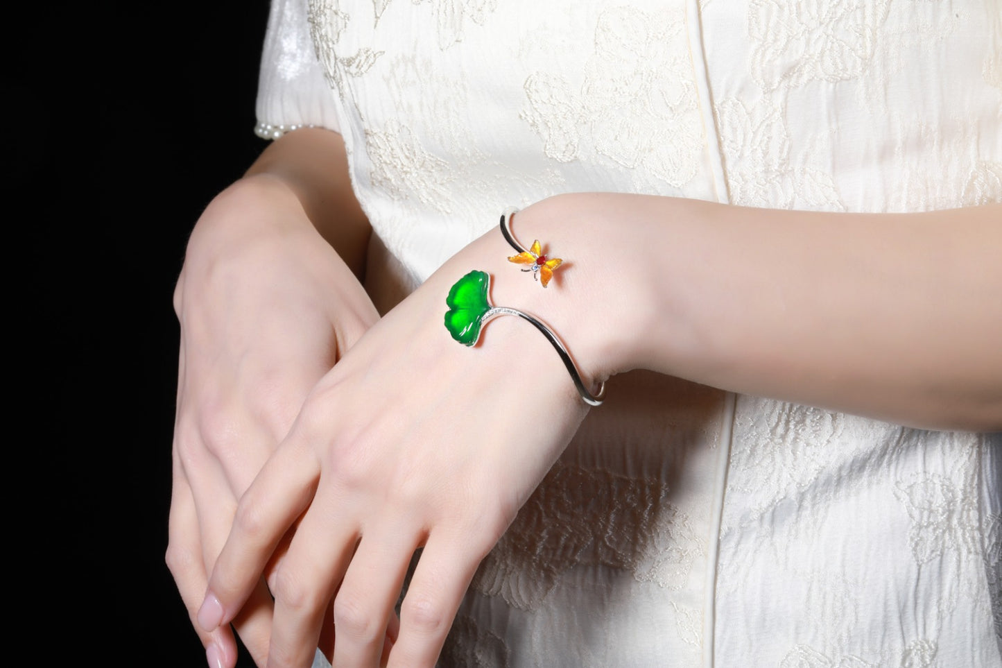 "Three Lifetimes luck of Apricots"" Jade Bangle with Apricot Leaf Motif