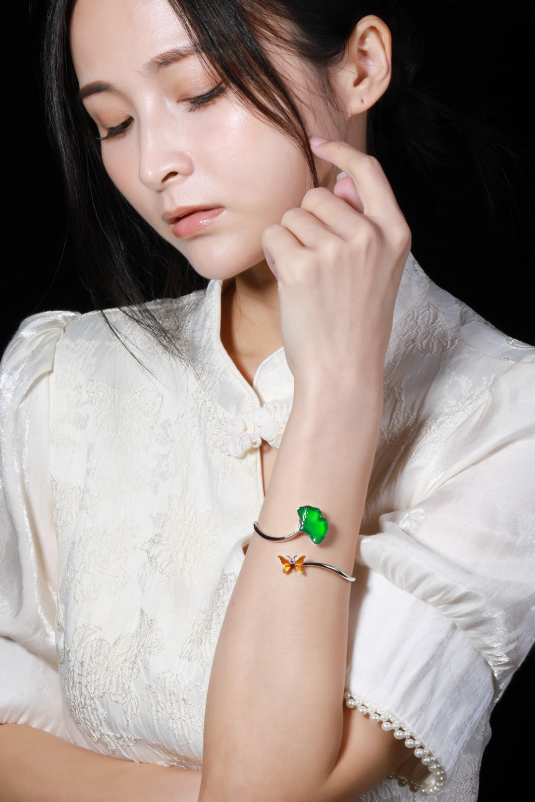 "Three Lifetimes luck of Apricots"" Jade Bangle with Apricot Leaf Motif